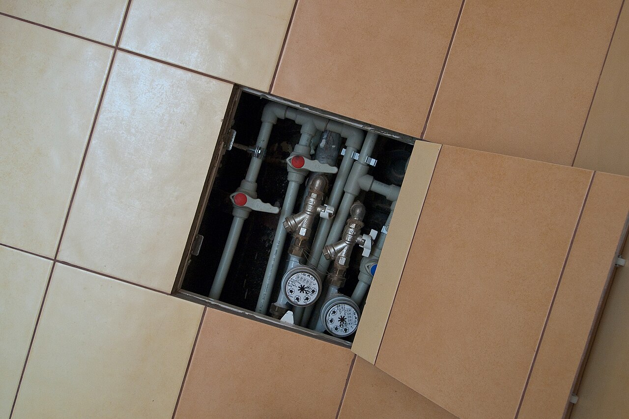 Household water meters on supply pipes