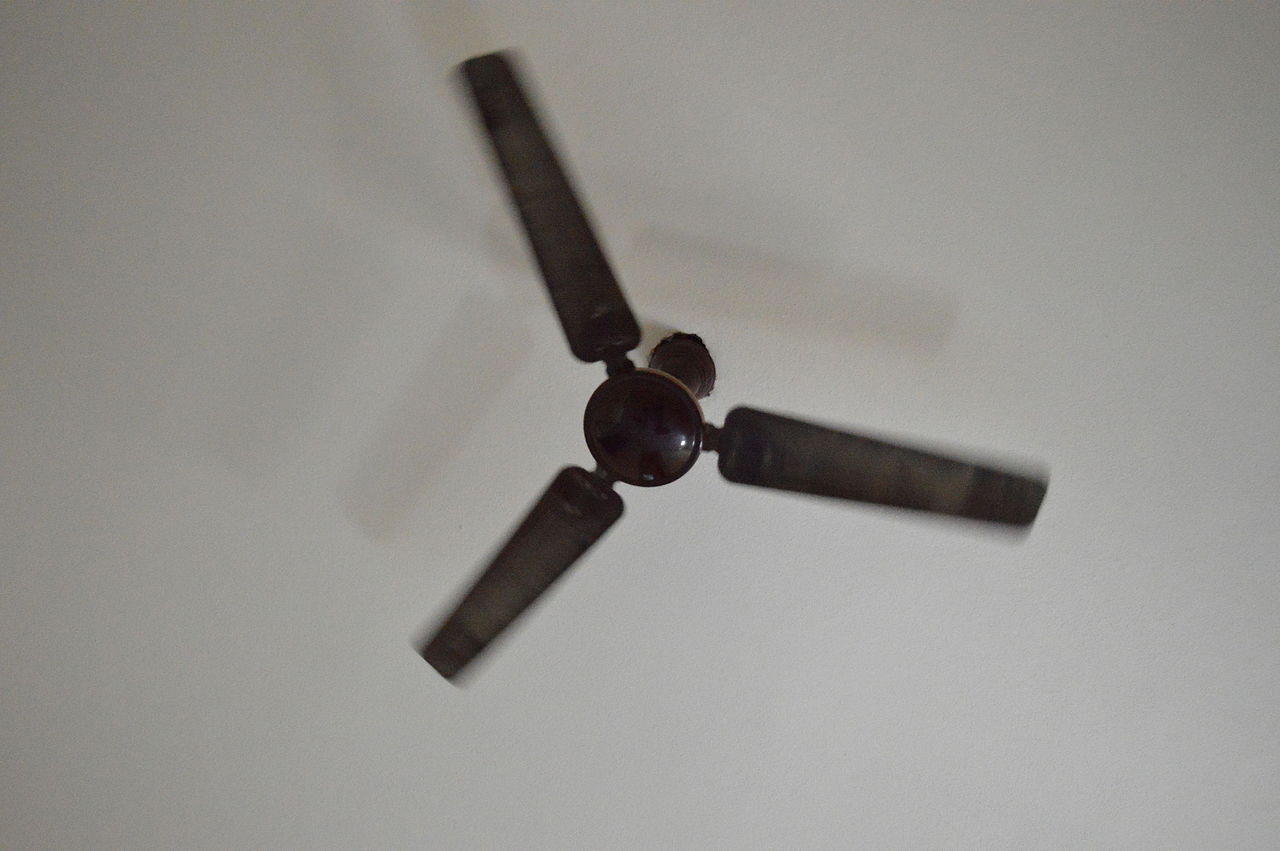 A ceiling fan circulating air in a home