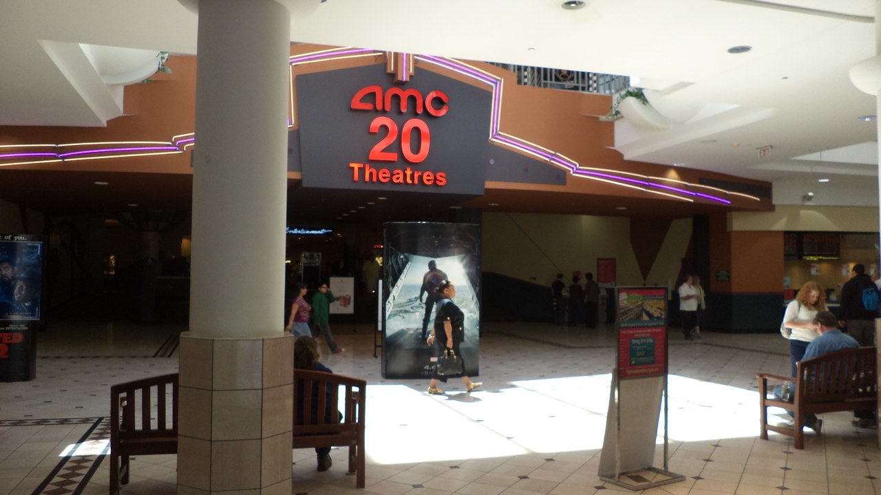 AMC will pay $56,000 after the EEOC said it cut the hours of a 22-year employee with cerebral palsy